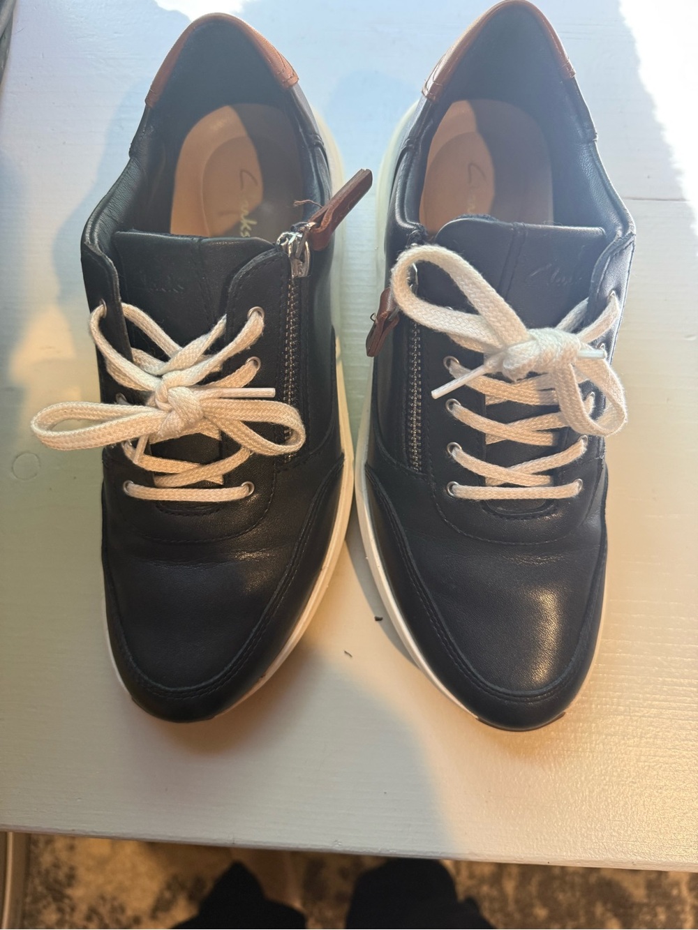 Clarks Navy Leather Women’s Sneakers with Brown Leather scent and White Laces
